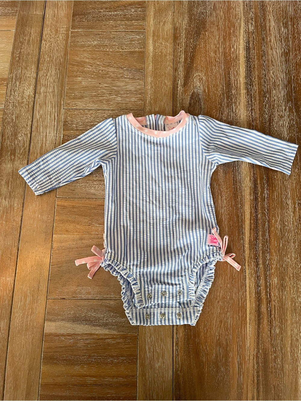 Ruffle Butts Blue & White Stripe Long-Sleeve One-Piece with Pink Trim